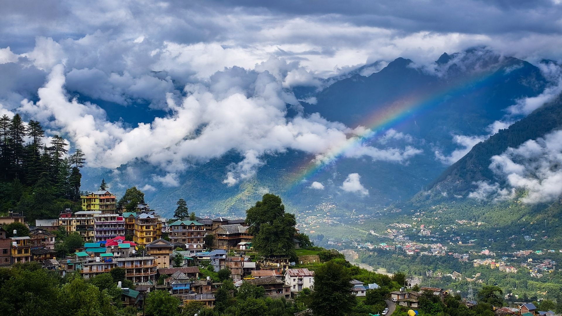 A rainbow over Naggar in Himachal Pradesh, appearing over the mountains after the rain.